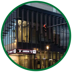 Image of exterior building representing a national account program for multi-location standardization of lighting design, specification, and procurement decisions. 