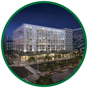 Image of building exterior representing access to a utility rebate tool for energy-efficient upgrades and incentives.