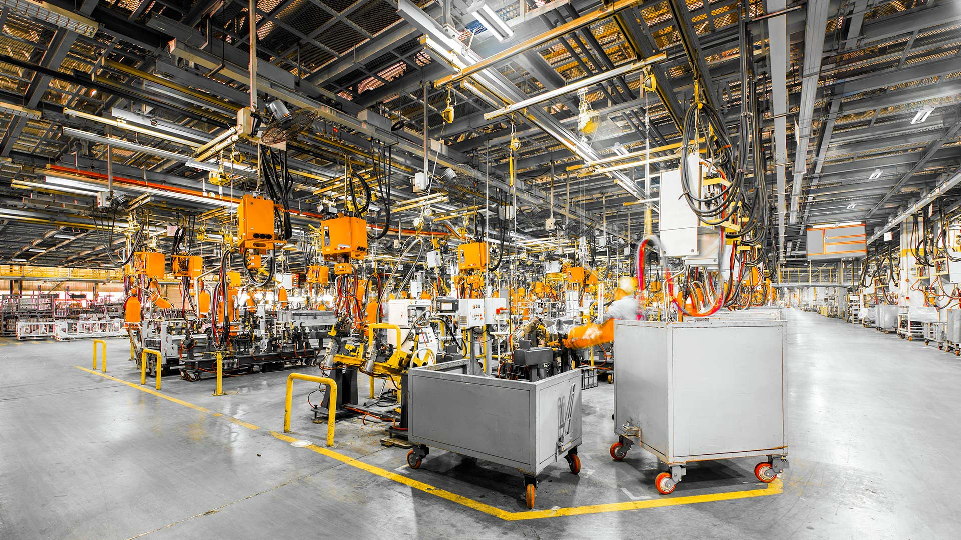 Busy warehouse lit by Lithonia’s Beyond Linear LED High Bays 