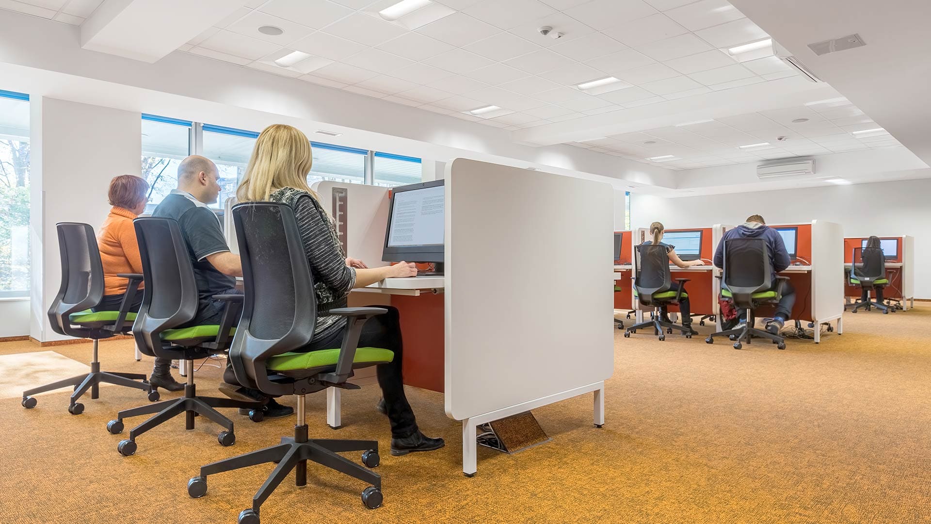 Lithonia's STACK LED lay-in lights illuminate the workspace for employees.