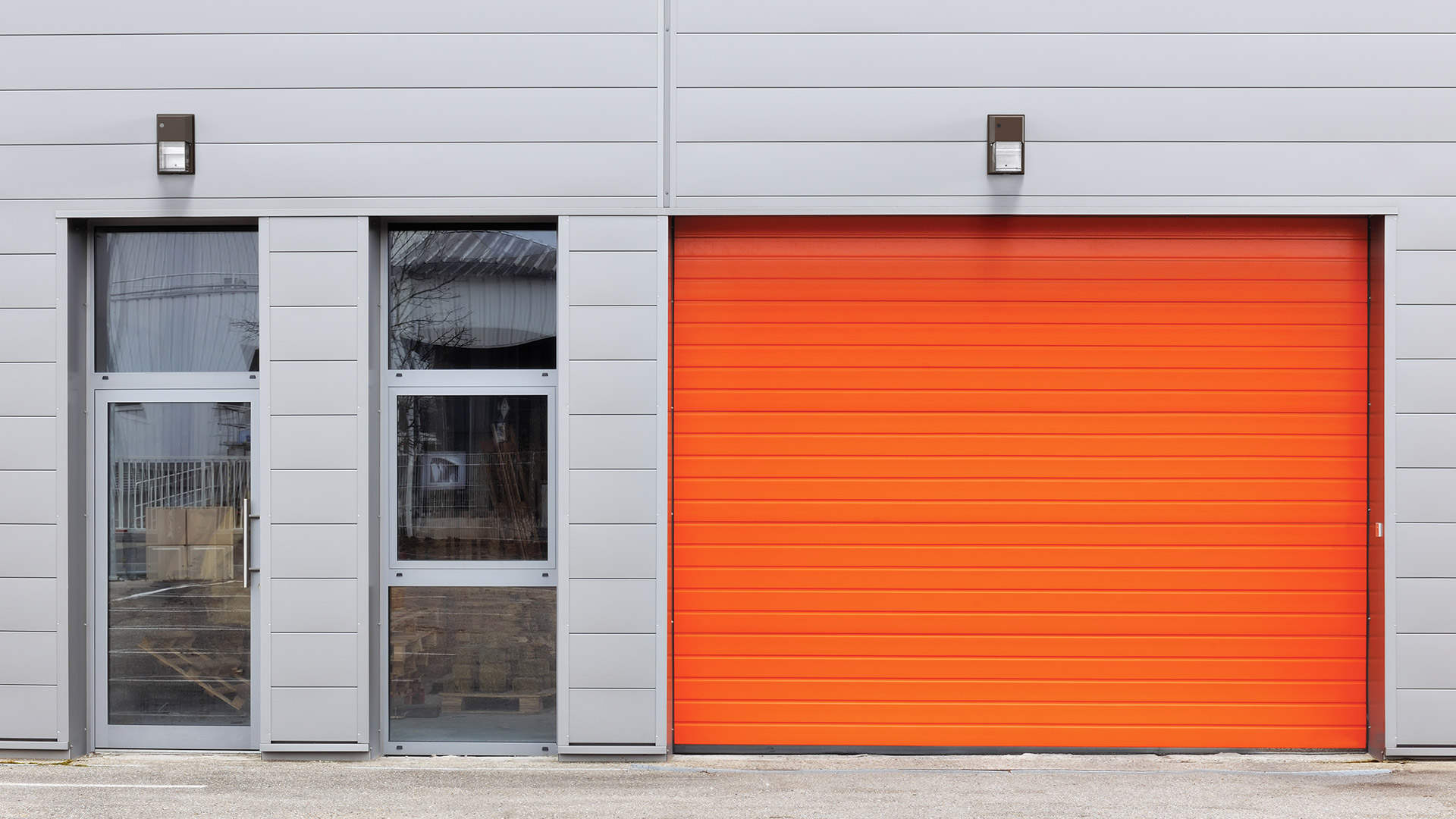 Commercial building with TWR led wall packs over the doors