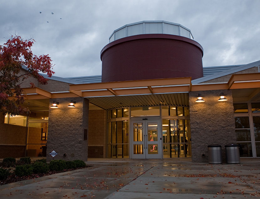 Scirocco fixtures illuminate entrance to building